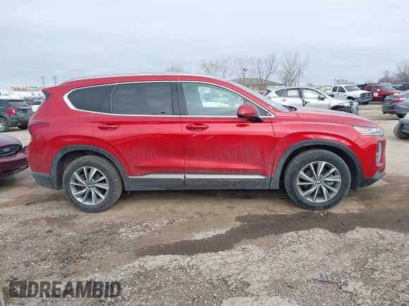 2019 Hyundai Santa Fe SEL with VIN 5NMS33AD2KH062604, listed as a IAAI auction lot 41543643 with 74,407 mi miles and . Bid and sale history available at DreamBid. Image 14.