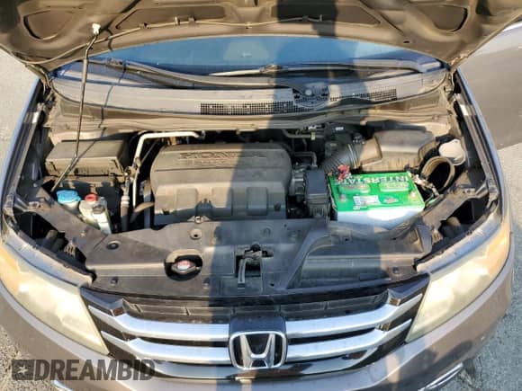 2015 Honda Odyssey Touring Elite с VIN 5FNRL5H94FB078340, выставлен на аукционе Copart как лот 80651515 с пробегом 171 249 миль миль и Списание • Salvage title. История ставок и продаж доступна на DreamBid. Изображение 12.