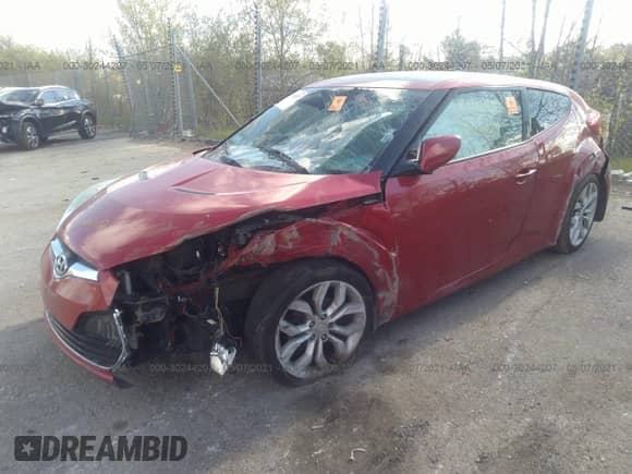 2013 Hyundai Veloster w/Black Int z VIN KMHTC6ADXDU087019, wystawiony jako IAAI lot #38051249 z przebiegiem Nie podano mil oraz . Historia ofert i sprzedaży dostępna na DreamBid. Obrazek 2.