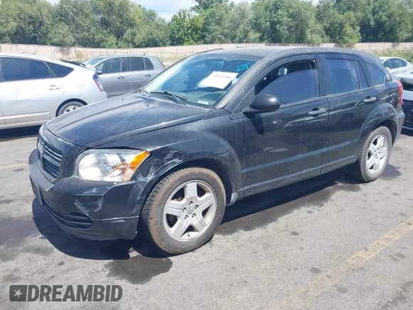 2010 Dodge Caliber z VIN 1B3CB1HA2AD638918, wystawiony jako IAAI lot #43056508 z przebiegiem 128 997 mil mil oraz . Historia ofert i sprzedaży dostępna na DreamBid. Obrazek 2.
