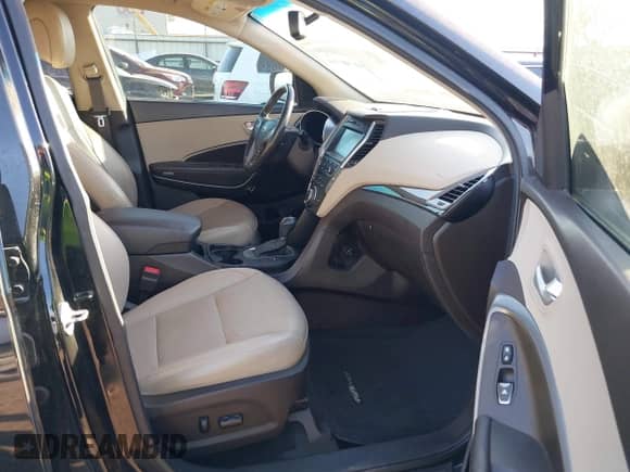 2017 Hyundai Santa Fe 2.0T с VIN 5NMZUDLA4HH039547, выставлен на аукционе IAAI как лот 41740744 с пробегом 122 641 миль миль и . История ставок и продаж доступна на DreamBid. Изображение 5.