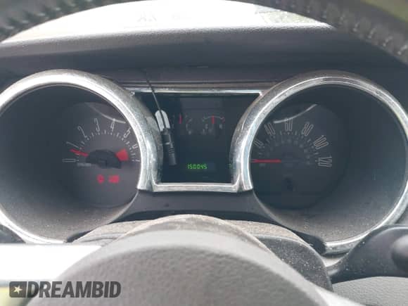 2007 Ford Mustang Deluxe z VIN 1ZVFT84N275344624, wystawiony jako IAAI lot #43219603 z przebiegiem 150 045 mil mil oraz . Historia ofert i sprzedaży dostępna na DreamBid. Obrazek 7.