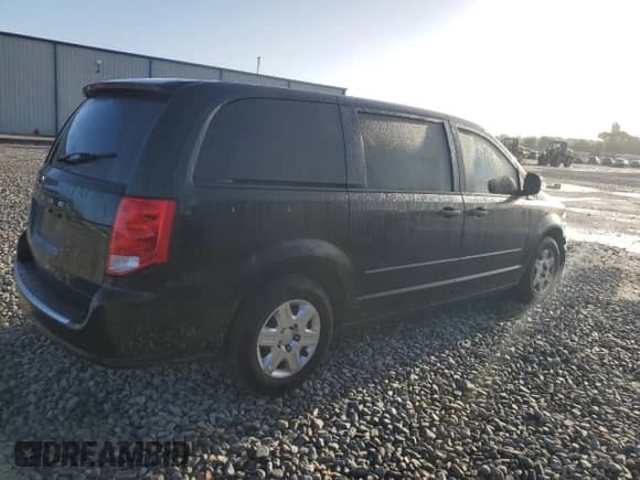 2013 Dodge Grand Caravan SE with VIN 2C4RDGBG1DR608040, listed as a Copart auction lot 85318475 with 107,927 mi miles and Salvage title. Bid and sale history available at DreamBid. Image 3.