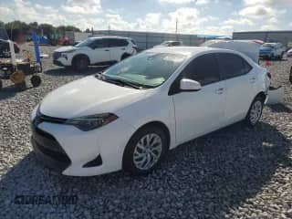 2019 Toyota Corolla LE z VIN 5YFBURHE5KP895284, wystawiony jako Copart lot #87229175 z przebiegiem 139 141 mil mil oraz Nie do naprawy • Non repairable. Historia ofert i sprzedaży dostępna na DreamBid. Obrazek 1.