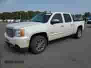 2013 GMC Sierra 1500 Denali with VIN 3GTP2XE20DG309190, listed as a Copart auction lot 71746495 with 192,231 mi miles and Salvage title. Bid and sale history available at DreamBid. Image 1.