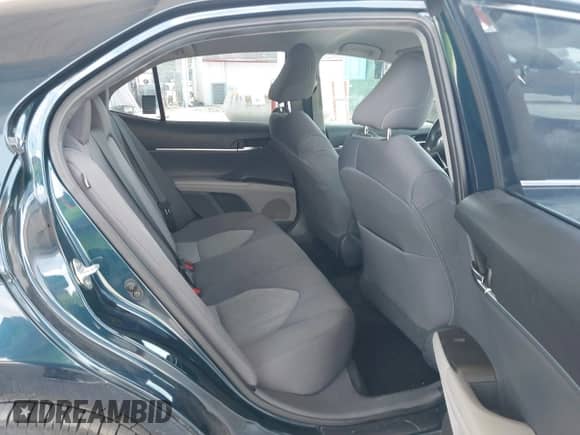 2021 Toyota Camry LE with VIN 4T1C11AK2MU534448, listed as a IAAI auction lot 43111658 with 89,877 mi miles and . Bid and sale history available at DreamBid. Image 8.