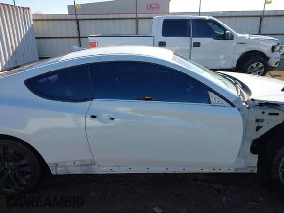 2013 Hyundai Genesis Coupe Grand Touring с VIN KMHHU6KJ5DU097433, выставлен на аукционе IAAI как лот 41266271 с пробегом 116 871 миль миль и . История ставок и продаж доступна на DreamBid. Изображение 14.