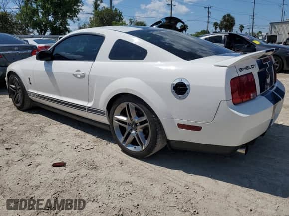 2009 Ford Mustang Shelby GT500 с VIN 1ZVHT88S295130535, выставлен на аукционе Copart как лот 72680554 с пробегом 69 646 миль миль и Списание • Salvage title. История ставок и продаж доступна на DreamBid. Изображение 2.
