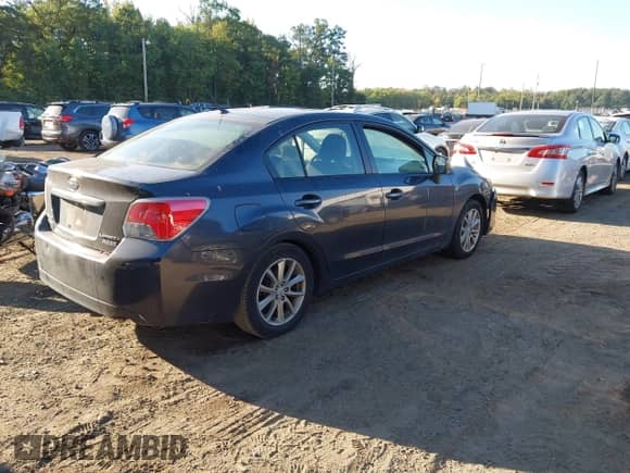 2012 Subaru Impreza Premium with VIN JF1GJAB60CH013748, listed as a IAAI auction lot 43145388 with 158,064 mi miles and . Bid and sale history available at DreamBid. Image 4.