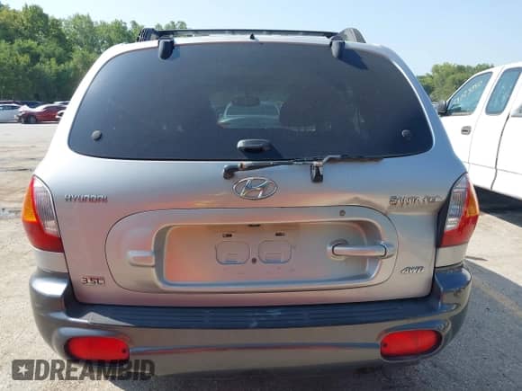 2004 Hyundai Santa Fe GLS with VIN KM8SC73E94U665022, listed as a IAAI auction lot 43022376 with 220,295 mi miles and . Bid and sale history available at DreamBid. Image 12.