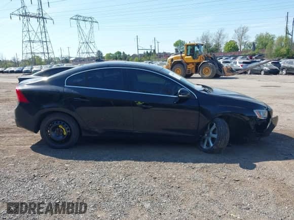 2016 Volvo S60 T5 Drive-E Premier z VIN YV126MFK8G2412344, wystawiony jako IAAI lot #42108519 z przebiegiem 129 579 mil mil oraz . Historia ofert i sprzedaży dostępna na DreamBid. Obrazek 14.
