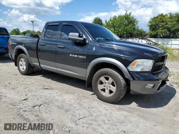 2011 Ram 1500 Lone Star with VIN 1D7RV1GP1BS541220, listed as a Copart auction lot 70029725 with 121,076 mi miles and Salvage title. Bid and sale history available at DreamBid. Image 4.