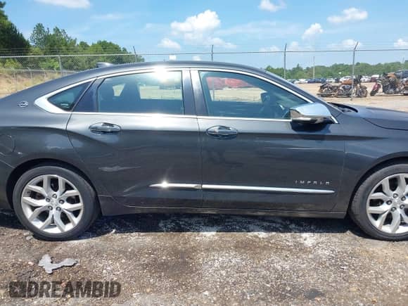 2015 Chevrolet Impala LTZ with VIN 1G1165S35FU113217, listed as a IAAI auction lot 42826834 with 298,383 mi miles and . Bid and sale history available at DreamBid. Image 14.