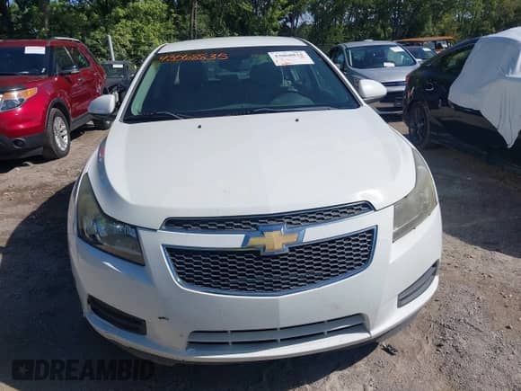 2011 Chevrolet Cruze 1LT z VIN 1G1PF5S96B7282475, wystawiony jako IAAI lot #43068835 z przebiegiem 178 181 mil mil oraz . Historia ofert i sprzedaży dostępna na DreamBid. Obrazek 12.