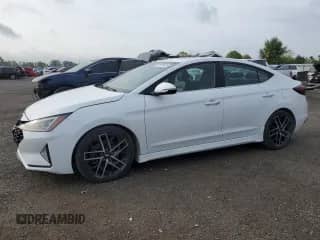 2019 Hyundai Elantra Sport с VIN KMHD04LB5KU826419, выставлен на аукционе Copart как лот 81378635 с пробегом 92 133 миль миль и Чистый • Clean title. История ставок и продаж доступна на DreamBid. Изображение 1.