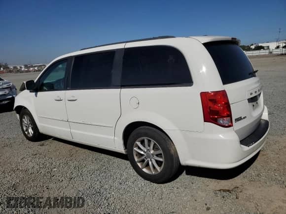 2013 Dodge Grand Caravan SXT with VIN 2C4RDGCG9DR618622, listed as a Copart auction lot 90457375 with 181,498 mi miles and Salvage title. Bid and sale history available at DreamBid. Image 2.