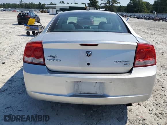 2010 Dodge Charger SXT с VIN 2B3CA3CV8AH237529, выставлен на аукционе Copart как лот 69405074 с пробегом 241 942 миль миль и Списание • Salvage title. История ставок и продаж доступна на DreamBid. Изображение 6.