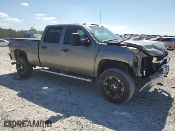 2014 Chevrolet Silverado 2500HD Work Truck z VIN 1GC1KVC83EF137290, wystawiony jako Copart lot #80095975 z przebiegiem 163 019 mil mil oraz Szkoda całkowita • Salvage title. Historia ofert i sprzedaży dostępna na DreamBid. Obrazek 4.