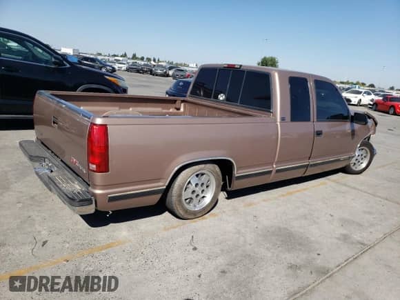 1995 GMC Sierra 1500 z VIN 2GTEC19K6S1544291, wystawiony jako Copart lot #75239664 z przebiegiem 191 251 mil mil oraz Szkoda całkowita • Salvage title. Historia ofert i sprzedaży dostępna na DreamBid. Obrazek 3.