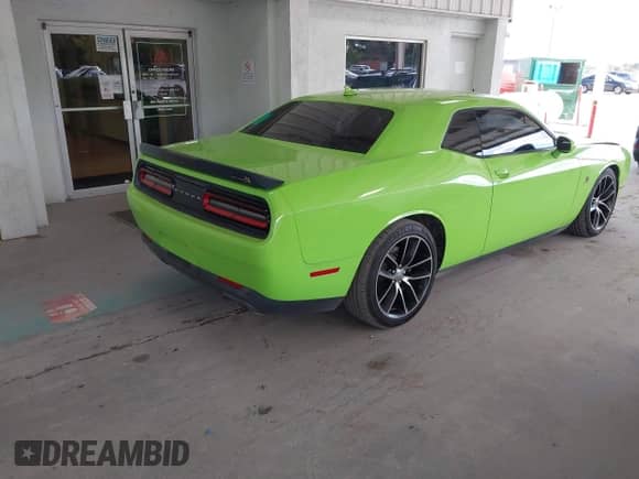 2015 Dodge Challenger R/T Scat Pack with VIN 2C3CDZFJ2FH710953, listed as a IAAI auction lot 43458618 with 133,019 mi miles and . Bid and sale history available at DreamBid. Image 4.