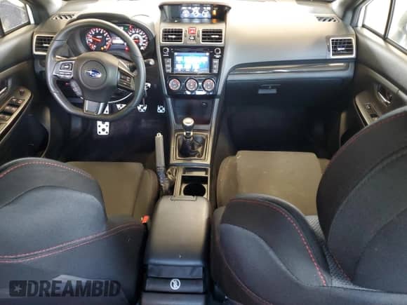 2021 Subaru WRX with VIN JF1VA1A6XM9818869, listed as a Copart auction lot 55393895 with 73,385 mi miles and Salvage title. Bid and sale history available at DreamBid. Image 8.