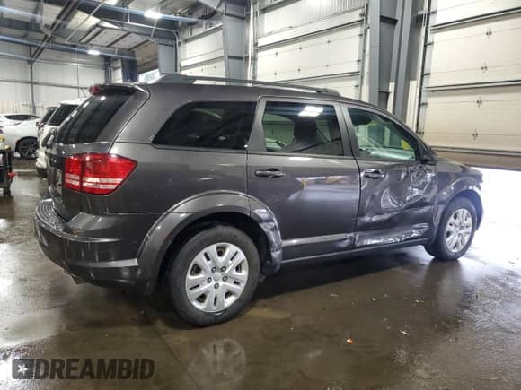 2019 Dodge Journey SE Value with VIN 3C4PDCAB3KT873414, listed as a Copart auction lot 65546175 with 133,095 mi miles and Salvage title. Bid and sale history available at DreamBid. Image 3.