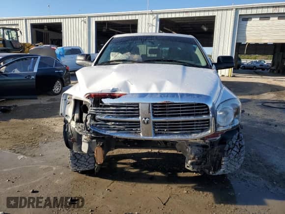 2007 Dodge 1500 SLT z VIN 3D7KR19DX7G751922, wystawiony jako Copart lot #76756934 z przebiegiem 145 115 mil mil oraz Szkoda całkowita • Salvage title. Historia ofert i sprzedaży dostępna na DreamBid. Obrazek 5.