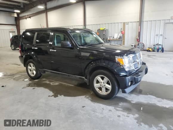 2008 Dodge Nitro SXT with VIN 1D8GT28K58W117204, listed as a Copart auction lot 67197825 with 185,175 mi miles and Salvage title. Bid and sale history available at DreamBid. Image 4.