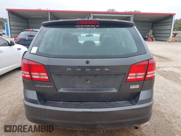 2014 Dodge Journey American Value with VIN 3C4PDCAB7ET247286, listed as a IAAI auction lot 41214056 with 205,222 mi miles and . Bid and sale history available at DreamBid. Image 16.