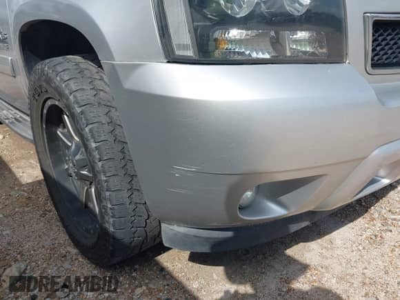 2014 Chevrolet Tahoe LS with VIN 1GNSCAE08ER110786, listed as a IAAI auction lot 42904735 with 175,776 mi miles and . Bid and sale history available at DreamBid. Image 6.