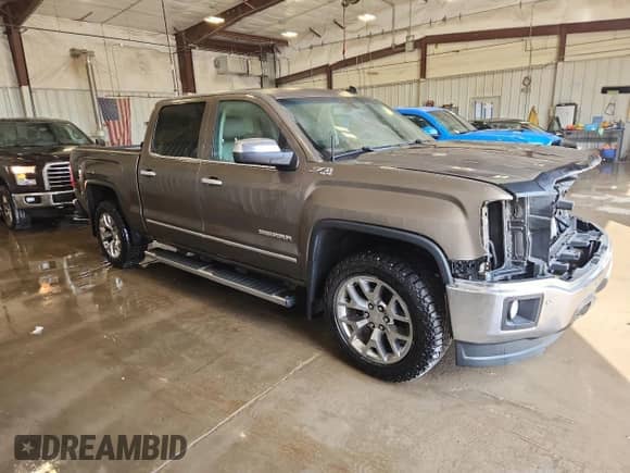2014 GMC Sierra 1500 SLT with VIN 3GTU2VEC6EG341174, listed as a Copart auction lot 80184675 with 143,395 mi miles and Salvage title. Bid and sale history available at DreamBid. Image 4.