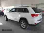 2013 Jeep Grand Cherokee Limited z VIN 1C4RJEBG6DC595730, wystawiony jako IAAI lot #43418036 z przebiegiem 163 431 mil mil oraz . Historia ofert i sprzedaży dostępna na DreamBid. Obrazek 14.