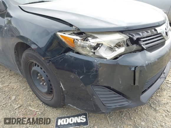 2014 Toyota Camry XLE with VIN 4T4BF1FK3ER375520, listed as a IAAI auction lot 43566867 with 242,702 mi miles and . Bid and sale history available at DreamBid. Image 6.