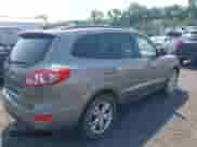2012 Hyundai Santa Fe SE with VIN 5XYZHDAG9CG153929, listed as a IAAI auction lot 42875318 with 108,927 mi miles and . Bid and sale history available at DreamBid. Image 4.