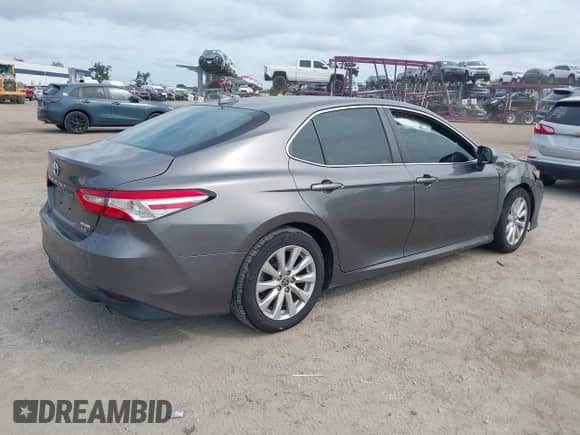 2020 Toyota Camry LE z VIN 4T1C11AK2LU999892, wystawiony jako IAAI lot #43225624 z przebiegiem Nie podano mil oraz . Historia ofert i sprzedaży dostępna na DreamBid. Obrazek 4.