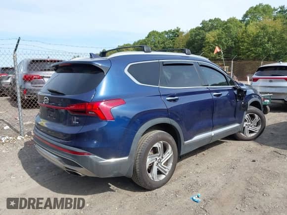 2021 Hyundai Santa Fe SEL z VIN 5NMS3DAJ0MH371194, wystawiony jako IAAI lot #43300588 z przebiegiem 60 801 mil mil oraz . Historia ofert i sprzedaży dostępna na DreamBid. Obrazek 4.