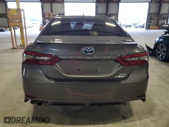 2023 Toyota Camry Hybrid XSE с VIN 4T1K31AK7PU608103, выставлен на аукционе Copart как лот 71901105 с пробегом 65 154 миль миль и Списание • Salvage title. История ставок и продаж доступна на DreamBid. Изображение 6.