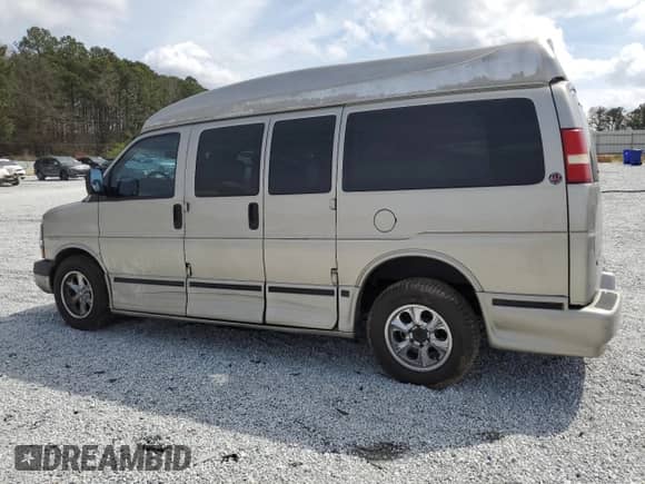 2004 Chevrolet Express Passenger с VIN 1GBFG15TX41155433, выставлен на аукционе Copart как лот 48826455 с пробегом 327 969 миль миль и Списание • Salvage title. История ставок и продаж доступна на DreamBid. Изображение 2.