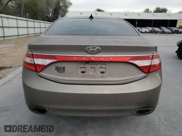 2013 Hyundai Azera с VIN KMHFH4JG6DA231521, выставлен на аукционе Copart как лот 50327805 с пробегом 176 041 миль миль и Списание • Salvage title. История ставок и продаж доступна на DreamBid. Изображение 6.