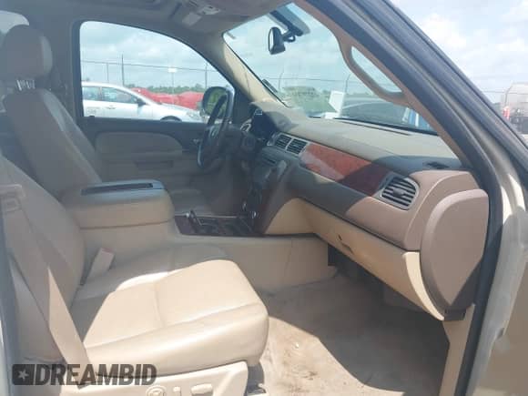 2013 Chevrolet Suburban LTZ with VIN 1GNSCKE0XDR322898, listed as a IAAI auction lot 42279704 with 213,429 mi miles and . Bid and sale history available at DreamBid. Image 5.