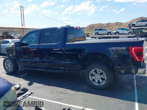 2023 Ford F-150 XLT с VIN 1FTFW1E89PKE05060, выставлен на аукционе IAAI как лот 43299204 с пробегом 79 389 миль миль и . История ставок и продаж доступна на DreamBid. Изображение 15.