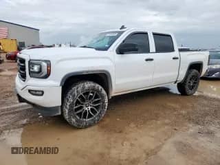 2016 GMC Sierra 1500 SLT with VIN 3GTU2NEC1GG107821, listed as a Copart auction lot 61454585 with 129,451 mi miles and Clean title. Bid and sale history available at DreamBid. Image 1.