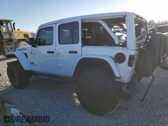 2022 Jeep Wrangler Unlimited Rubicon with VIN 1C4HJXFG6NW184670, listed as a Copart auction lot 84152964 with 31,459 mi miles and Salvage title. Bid and sale history available at DreamBid. Image 2.