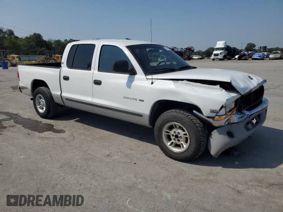 2000 Dodge Dakota Sport with VIN 1B7GL2ANXYS682705, listed as a Copart auction lot 80327865 with 219,406 mi miles and Salvage title. Bid and sale history available at DreamBid. Image 4.