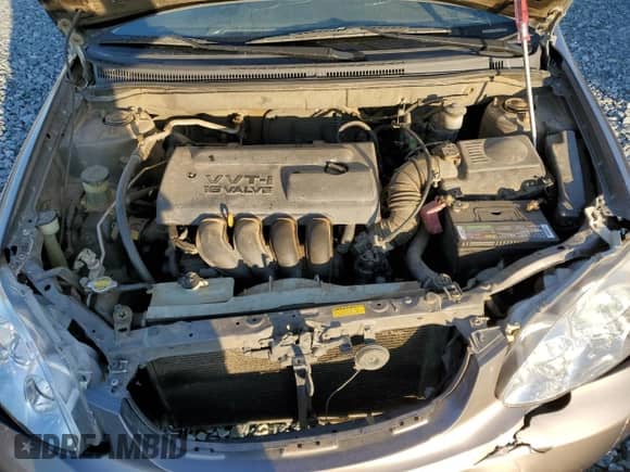 2003 Toyota Corolla CE z VIN 1NXBR32EX3Z099993, wystawiony jako Copart lot #90494205 z przebiegiem 157 341 mil mil oraz Szkoda całkowita • Salvage title. Historia ofert i sprzedaży dostępna na DreamBid. Obrazek 11.