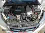 2015 Honda Accord Touring z VIN 1HGCR6F79FA012193, wystawiony jako Copart lot #64141615 z przebiegiem 238 263 mil mil oraz Szkoda całkowita • Salvage title. Historia ofert i sprzedaży dostępna na DreamBid. Obrazek 11.