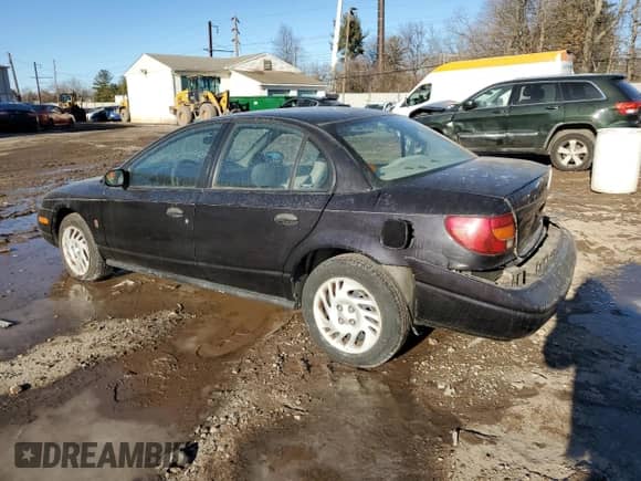 2000 Saturn SL with VIN 1G8ZH5283YZ169267, listed as a Copart auction lot 42626335 with 131,556 mi miles and Salvage title. Bid and sale history available at DreamBid. Image 2.