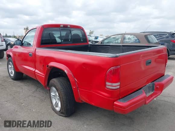 1999 Dodge Dakota SLT with VIN 1B7GL26Z5XS217114, listed as a IAAI auction lot 43418147 with 145,280 mi miles and . Bid and sale history available at DreamBid. Image 3.