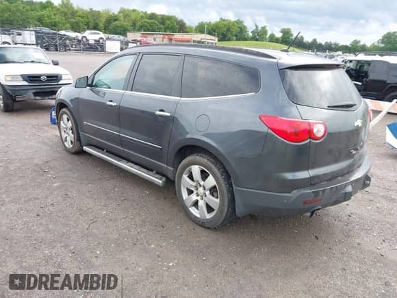 2009 Chevrolet Traverse LTZ with VIN 1GNER33DX9S124927, listed as a IAAI auction lot 42192814 with 185,302 mi miles and . Bid and sale history available at DreamBid. Image 3.
