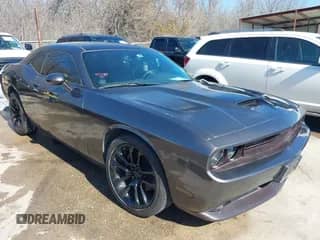 2013 Dodge Challenger R/T with VIN 2C3CDYBT4DH560133, listed as a IAAI auction lot 41660134 with 221,827 mi miles and . Bid and sale history available at DreamBid. Image 1.